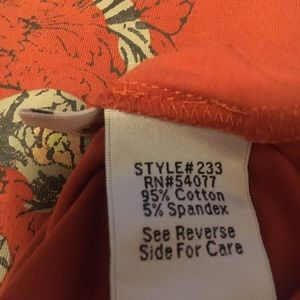 CAbi Tops - Long sleeve cabi graphic tee in rusty orange. CAbi Tops - Long sleeve cabi graphic tee in rusty orange.